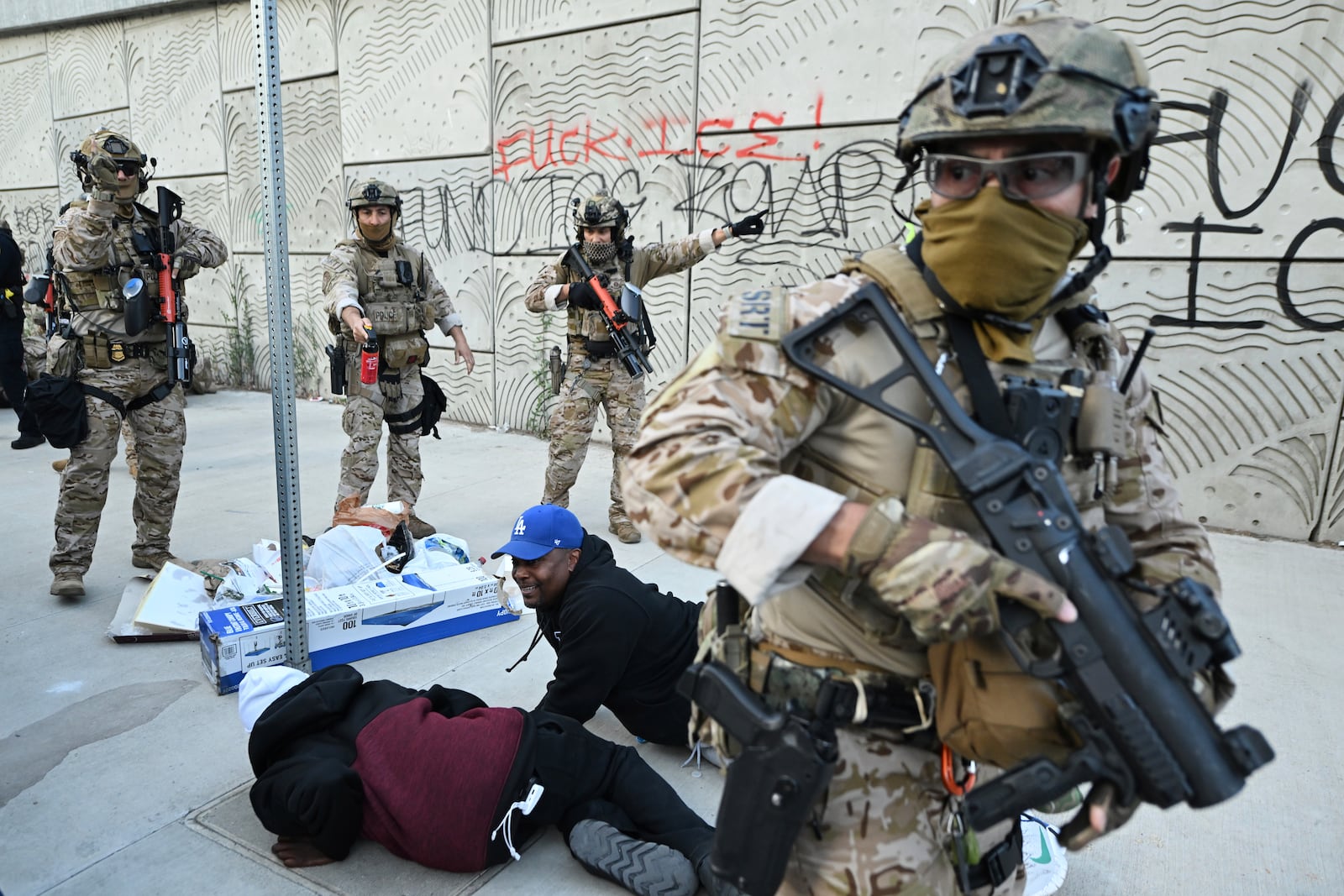 Members of the California National Guard surround demonstrators during protests on Thursday, June 12, 2025, in Los Angeles (AP Photo/Wally Skalij)