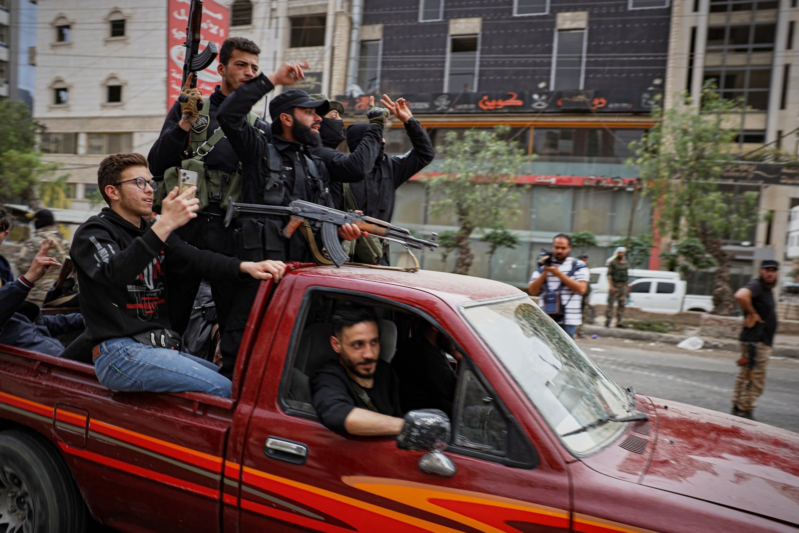 Members of Syria's security forces deploy in the town of Sahnaya, south of Damascus, on Wednesday, April 30, 2025, after earlier clashes with Druze fighters left at least 11 people dead. (AP Photo/Omar Albam)