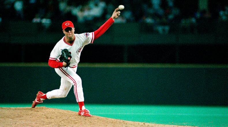 FILE - Cincinnati Reds pitcher Tom Browning delivers a pitch during a game against the Los Angeles Dodgers at Riverfront Stadium in Cincinnati, Sept. 16, 1988. Browning threw a perfect game as the Reds won 1-0. Browning, an All-Star pitcher who threw the only perfect game in Cincinnati Reds history and helped them win a World Series title, died on Monday, Dec. 19, 2022. He was 62. (AP Photo, File)