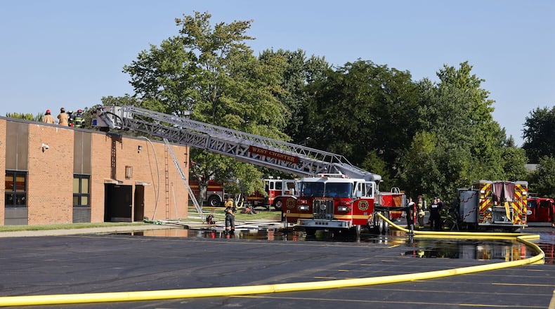 Crews from multiple departments were called to a fire at Lakota's Hopewell Junior School Monday, Sept. 4, 2023 on Cox Road in West Chester Township. NICK GRAHAM/STAFF