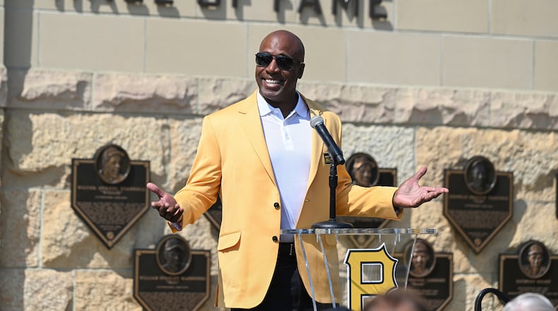 FILE - Former Pittsburgh Pirates outfielder Barry Bonds acknowledges the crowd during a ceremony for players that are part of the team's 2024 Hall of Fame class before a baseball game against the Cincinnati Reds in Pittsburgh, Saturday, Aug. 24, 2024. (AP Photo/Barry Reeger, File)