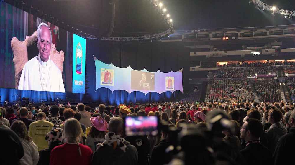 Pope Leo XIV speaks remotely from the Vatican to thousands of Catholics at the National Catholic Youth Conference on Friday, Nov. 21, 2025, in Indianapolis. (AP Photo/Obed Lamy)