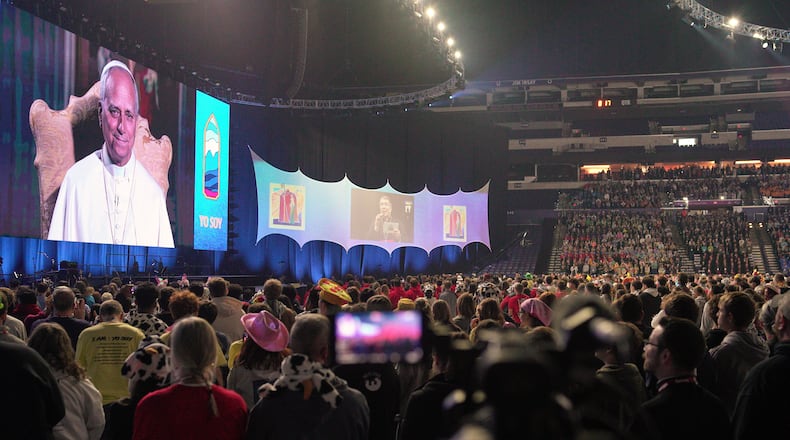 Pope Leo XIV speaks remotely from the Vatican to thousands of Catholics at the National Catholic Youth Conference on Friday, Nov. 21, 2025, in Indianapolis. (AP Photo/Obed Lamy)