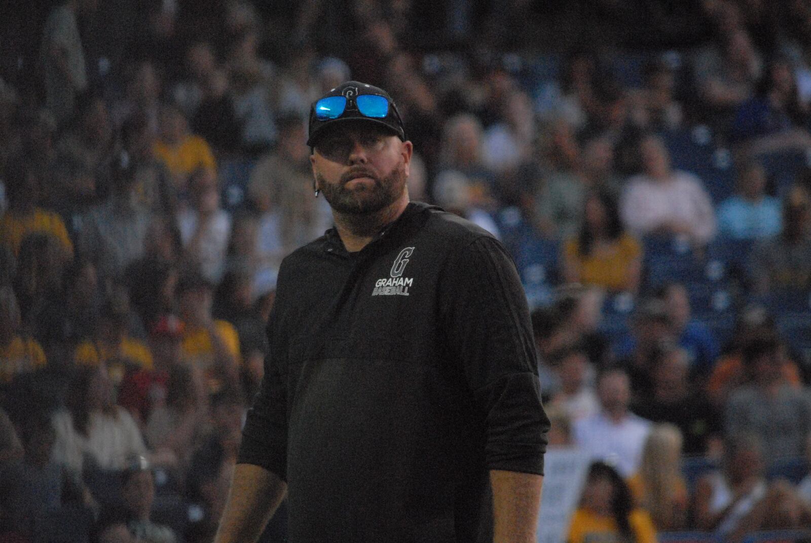 Graham coach Spencer Mitchell looks on during his Falcons' Division V state final game against Waynedale on Sunday at Canal Park in Akron. CHRIS VOGT / CONTRIBUTED