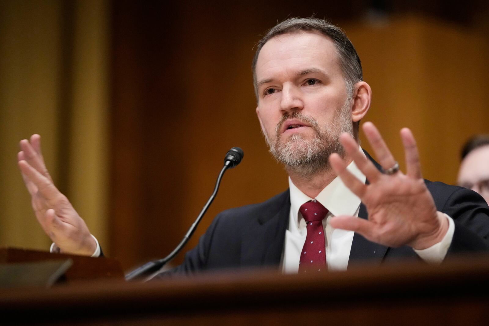 U.S. Trade Representative Jamieson Greer testifies before the Senate Finance Committee on Capitol Hill in Washington, Tuesday, April 8, 2025. (AP Photo/Mark Schiefelbein)