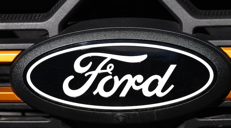 FIEL - The company logo is shown on the grille of an unsold 2026 F-series pickup truck on the lot of a Ford dealership, Sunday, Nov. 2, 2025, in Littleton, Colo. (AP Photo/David Zalubowski, File)