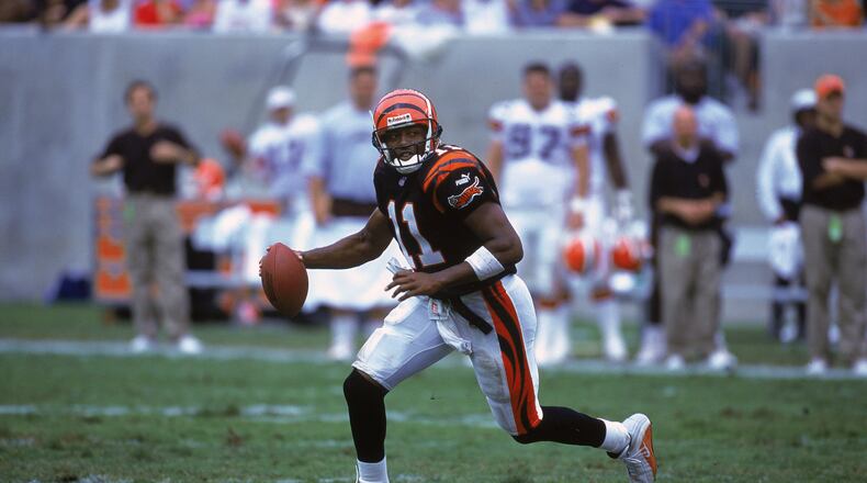 10 Sep 2000: Akili Smith #11 of the Cincinnati Bengals runs with the ball during the game against the Cleveland Browns at the Paul Brown Stadium in Cincinnati, Ohio. The Browns defeated the Bengals 24-7.Mandatory Credit: Jonathan Daniel /Allsport