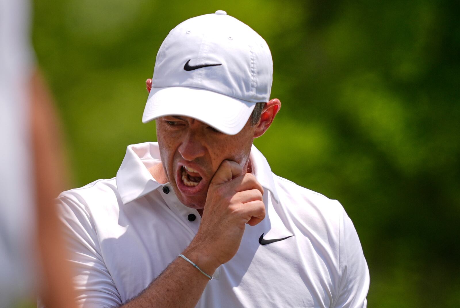 Rory McIlroy, of North Ireland, reacts after hitting off the 2nd tee during the final round of the PGA Zurich Classic golf tournament at TPC Louisiana in Avondale, La., Sunday, April 27, 2025. (AP Photo/Gerald Herbert)