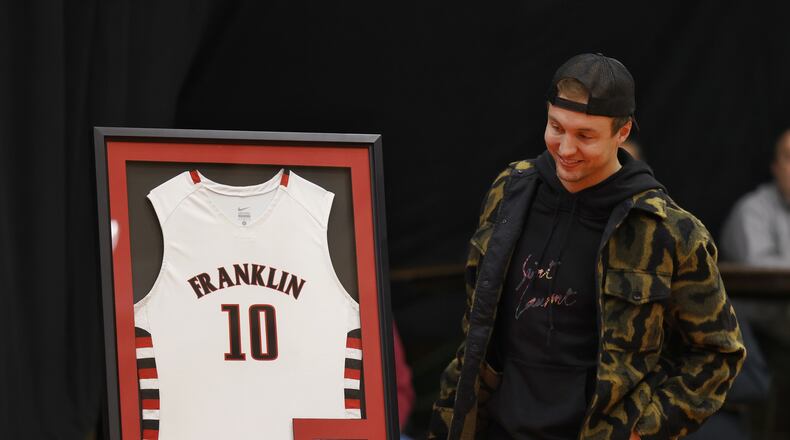 Former Franklin Wildcat and current Los Angeles Clippers basketball player Luke Kennard was honored by having his number 10 jersey retired before Franklin's basketball game against Springboro Tuesday, Feb. 1, 2022 in Franklin. NICK GRAHAM/STAFF