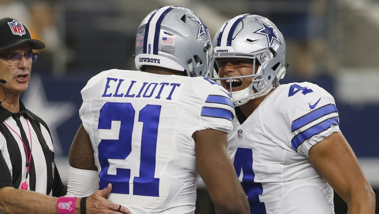 Cowboys rookies Ezekiel Elliott and Dak Prescott have led the team to the NFC's No. 1 playoff seed.