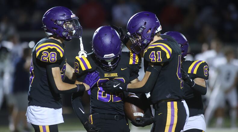 Bellbrook celebrates after an interception by Noah Barrios, center, against Valley View on Friday, Sept. 6, 2024, in Bellbrook. David Jablonski/Staff