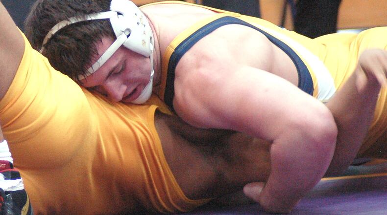 Springfield’s Joe Cochran works for the fall during his 195-pound title match at the GWOC tournament last year at Butler High School. Cochran claimed his second title with a fall in 5:33. JOHN CUMMINGS / CONTRIBUTED