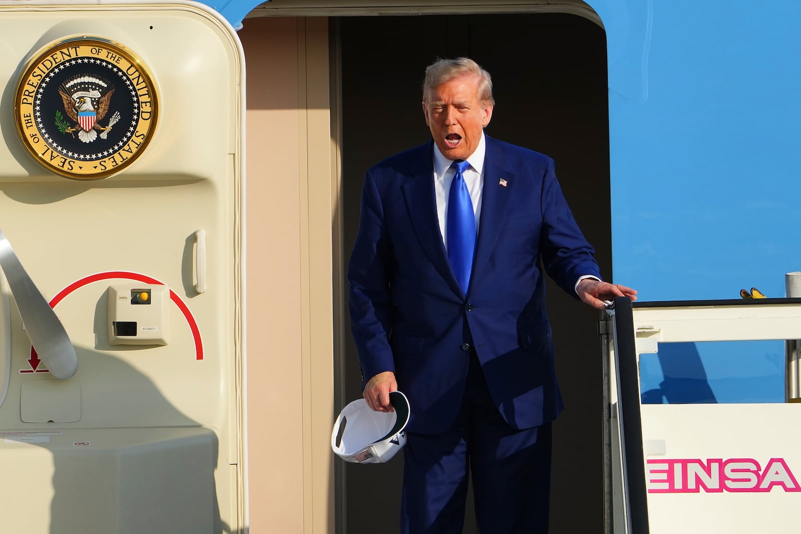 President Donald Trump arrives at Amsterdam Schiphol Airport ahead of the NATO summit, taking place in The Hague, Netherlands, Tuesday, June 24, 2025. (AP Photo/Peter Dejong)