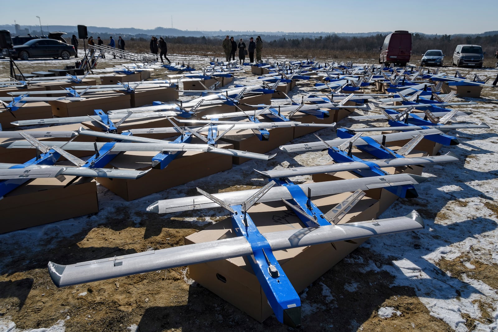 FILE - Ukrainian-made fixed-wing Besomar 3210 drone interceptors are handed over to the Armed Forces by Kozytskyi Charity Foundation in an undisclosed location in the Lviv region, western Ukraine, Friday, Feb. 21, 2025. (AP Photo/Mykola Tys, File)