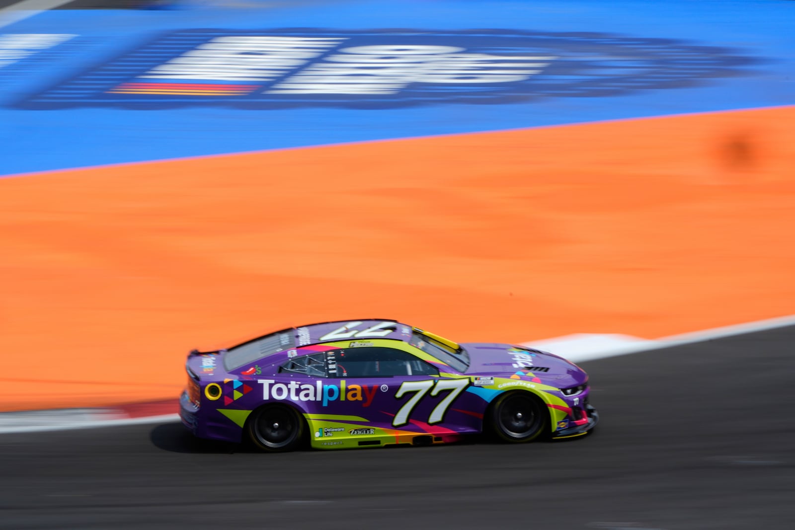 Carson Hocevar drives through turn Th13 during the first practice session of NASCAR Cup Series auto race at Hermanos Rodriguez race track in Mexico City, Friday, June 13, 2025. (AP Photo/Fernando Llano)