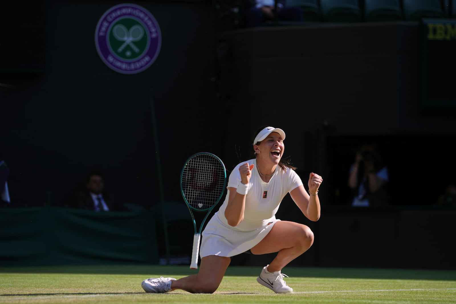 Amanda Anisimova of the U.S. celebrates winning the women's singles quarter finals match against Anastasia Pavlyuchenkova of Russia at the Wimbledon Tennis Championships in London, Tuesday, July 8, 2025.(AP Photo/Kin Cheung)