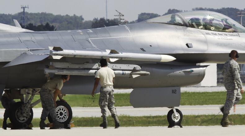 F-16 crews from the Ohio Air National Guard’s 180th Fighter Wing flew training missions out of Wright-Patterson Air Force Base in 2013, as their home runway at Toledo Express Airport is repaved. CHRIS STEWART / STAFF FILE PHOTO