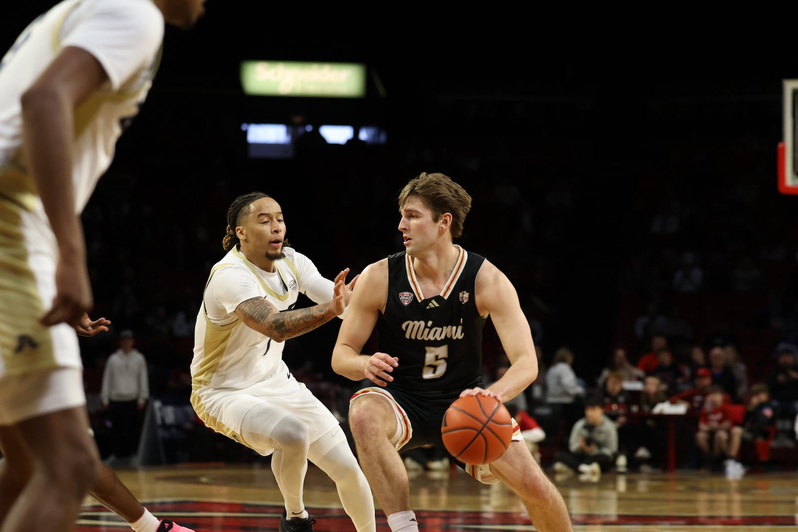 Miami’s Peter Suder (5) drives to the basket against Akron on Saturday at Millett Hall. ELIJAH COOK / CONTRIBUTED
