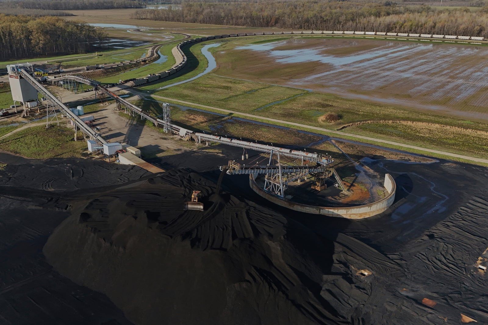 A bulldozer moves coal Thursday, April 10, 2025, in Princeton, Ind. (AP Photo/Joshua A. Bickel)
