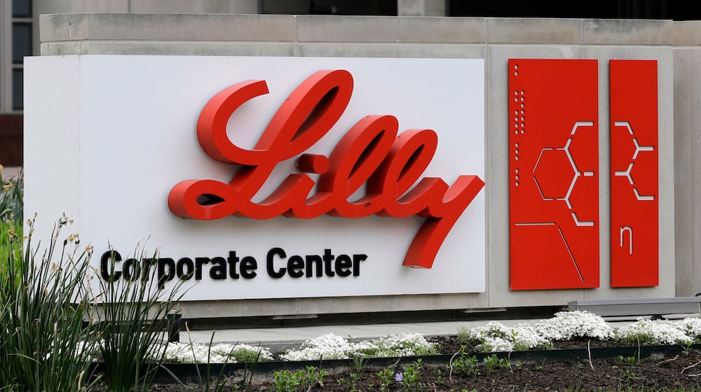 FILE - A sign for Eli Lilly & Co. stands outside their corporate headquarters in Indianapolis on April 26, 2017. (AP Photo/Darron Cummings, File)
