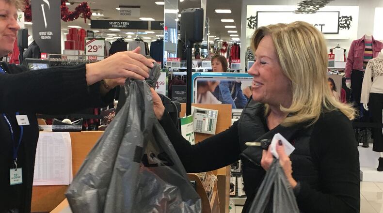 Holiday shoppers are already hitting store as the “Super Bowl” retail week approaches. Shoppers check out at the Centerville Kohl’s. STAFF PHOTO / HOLLY SHIVELY