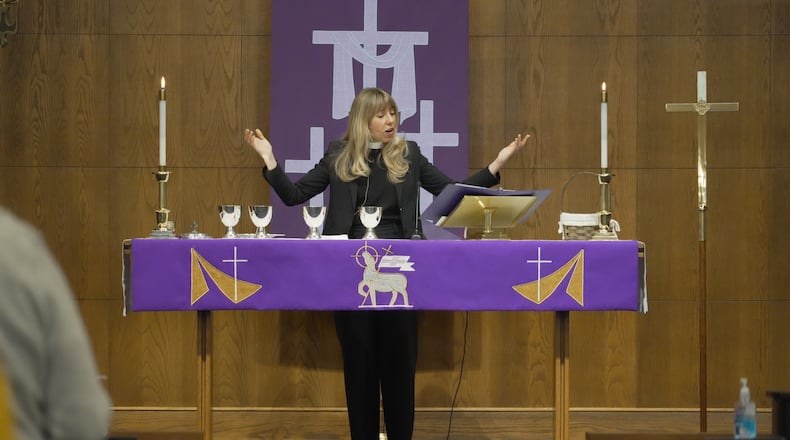 Rev. Sarah Trone Garriott, a Lutheran pastor and Iowa state senator, celebrates communion at Grace Lutheran Church in Des Moines, Iowa on Sunday, March 15, 2026. (AP Photo/Krysta Fauria)