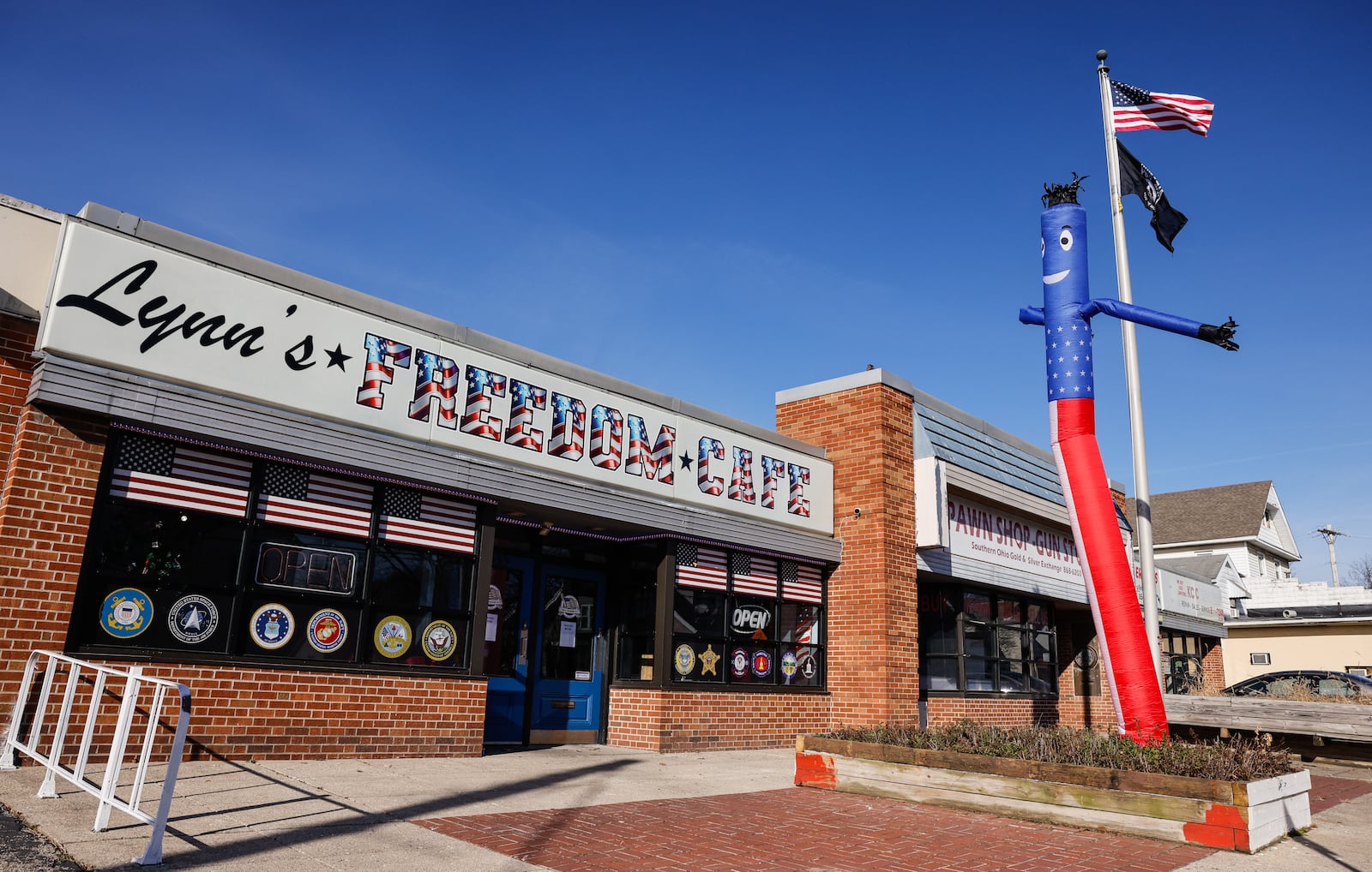 Lynn's Freedom Cafe is open daily on Pleasant Ave. in Hamilton's Lindenwald neighborhood. NICK GRAHAM/STAFF