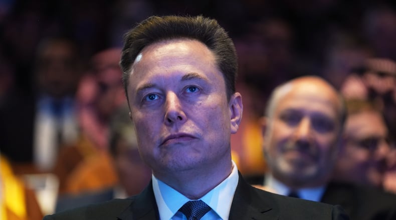 FILE - Elon Musk attends the Saudi Investment Forum at the Kennedy Center, Wednesday, Nov. 19, 2025, in Washington. (AP Photo/Evan Vucci, File)