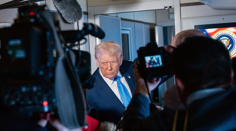 President Donald Trump speaks to the press as he traveled aboard Air Force One to South Korea for an economic summit, on Wednesday, Oct. 29, 2025. The Trump administration says it has plenty of other options to impose tariffs, if the court rules against the president. (Haiyun Jiang/The New York Times)
