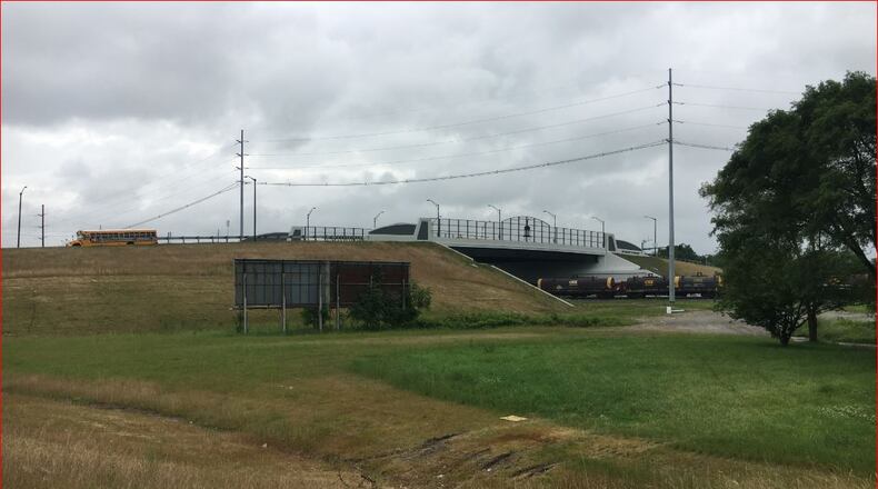 The new South Hamilton Crossing, which opened in December, is handling fair amounts of traffic, but city officials aren’t sure how much has been diverted from the corridor of High and Main streets, where congestion remains high during morning and evening commute times. MIKE RUTLEDGE/STAFF