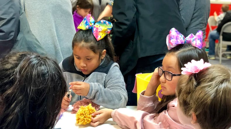 Young students make creations at the Fitton Center for Creative Arts on Monument Avenue in Hamilton. CONTRIBUTED