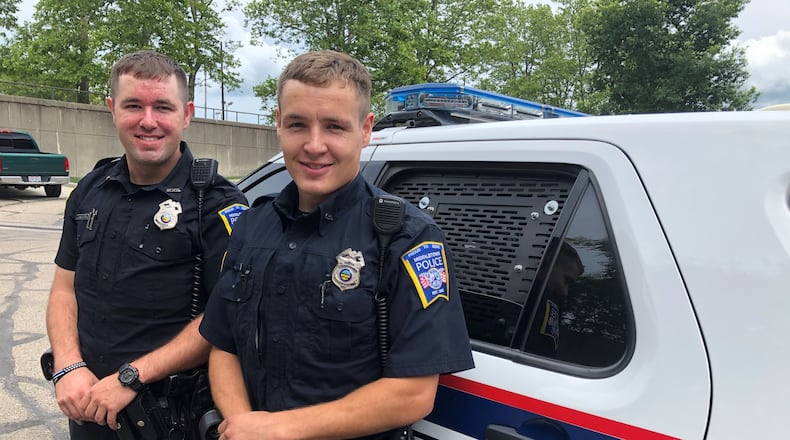 Brothers Josh Singleton (left) and Brian Singleton recently joined the Middletown Division of Police department. The Edgewood High School graduates are believed to be only the second set of brothers on the police force. RICK McCRABB / STAFF