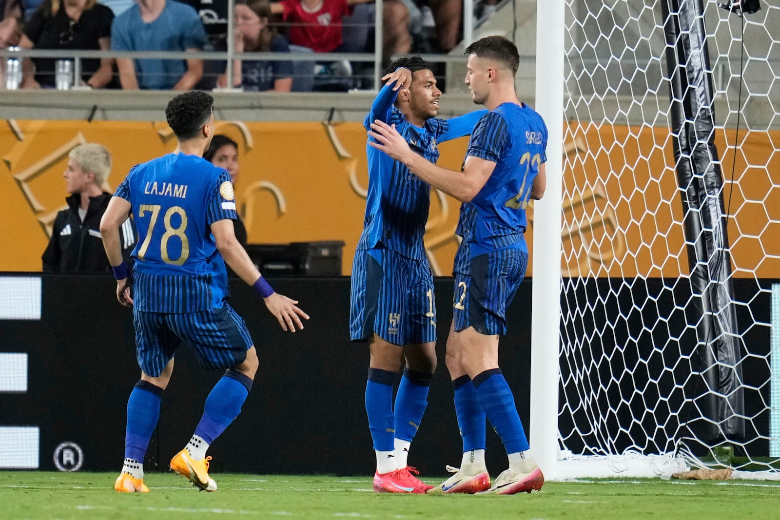 Al Hilal's Marcos Leonardo, centre, is congratulated by teammates after scoring his team's fourth goal during the Club World Cup round of 16 soccer match between Manchester City and Al Hilal in Orlando, Fla., Monday, June 30, 2025. (AP Photo/John Raoux)