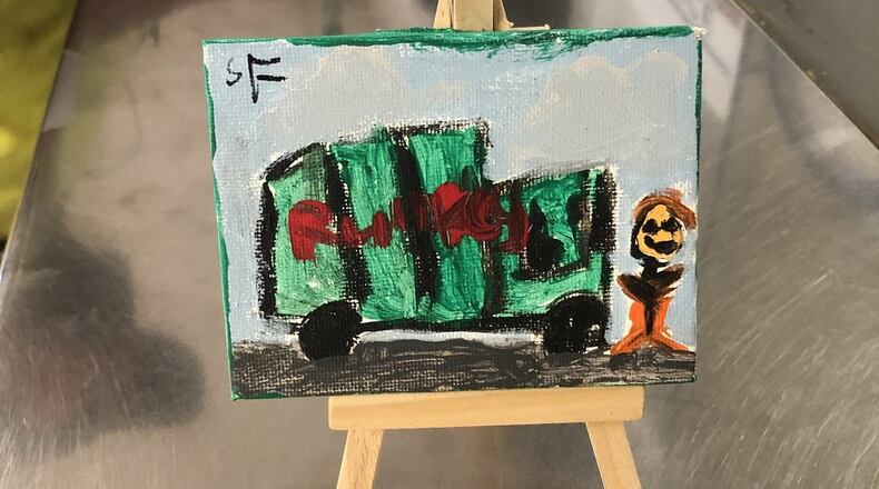 Rumpke drivers have seen a number of gifts and notes of appreciation since mid-March when Ohio enacted the first of two stay-at-home orders amid the novel coronavirus pandemic. Pictured is a painting one driver received during his route. PROVIDED