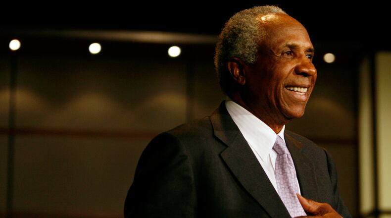 Hall of Fame player and Major League Baseball's first black manager Frank Robinson accepts the inaugural George Washington University Jackie Robinson Society Community Recognition Award for his contributions to baseball Thursday, April 12, 2007, at George Washington University in Washington. (AP Photo/Jacquelyn Martin)