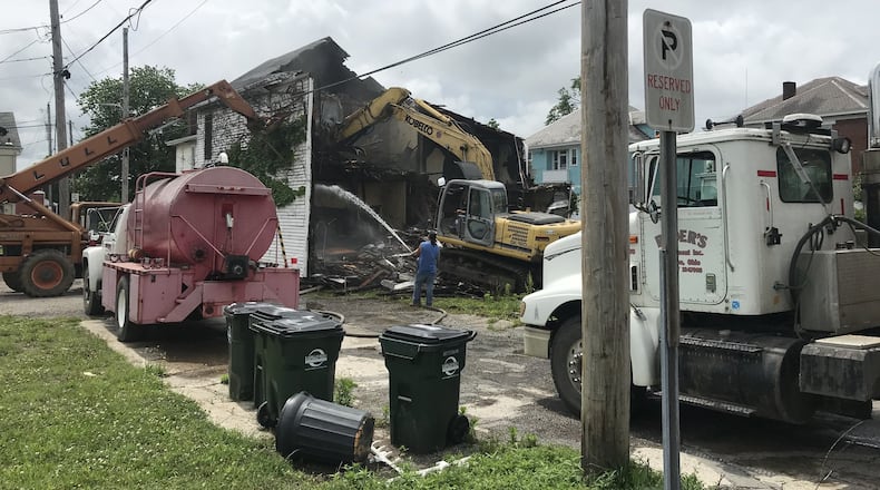 This building was torn down last week. It shared an address with 25 S. C St., and the owner has plans for the space it occupied, as an arts garden. PROVIDED