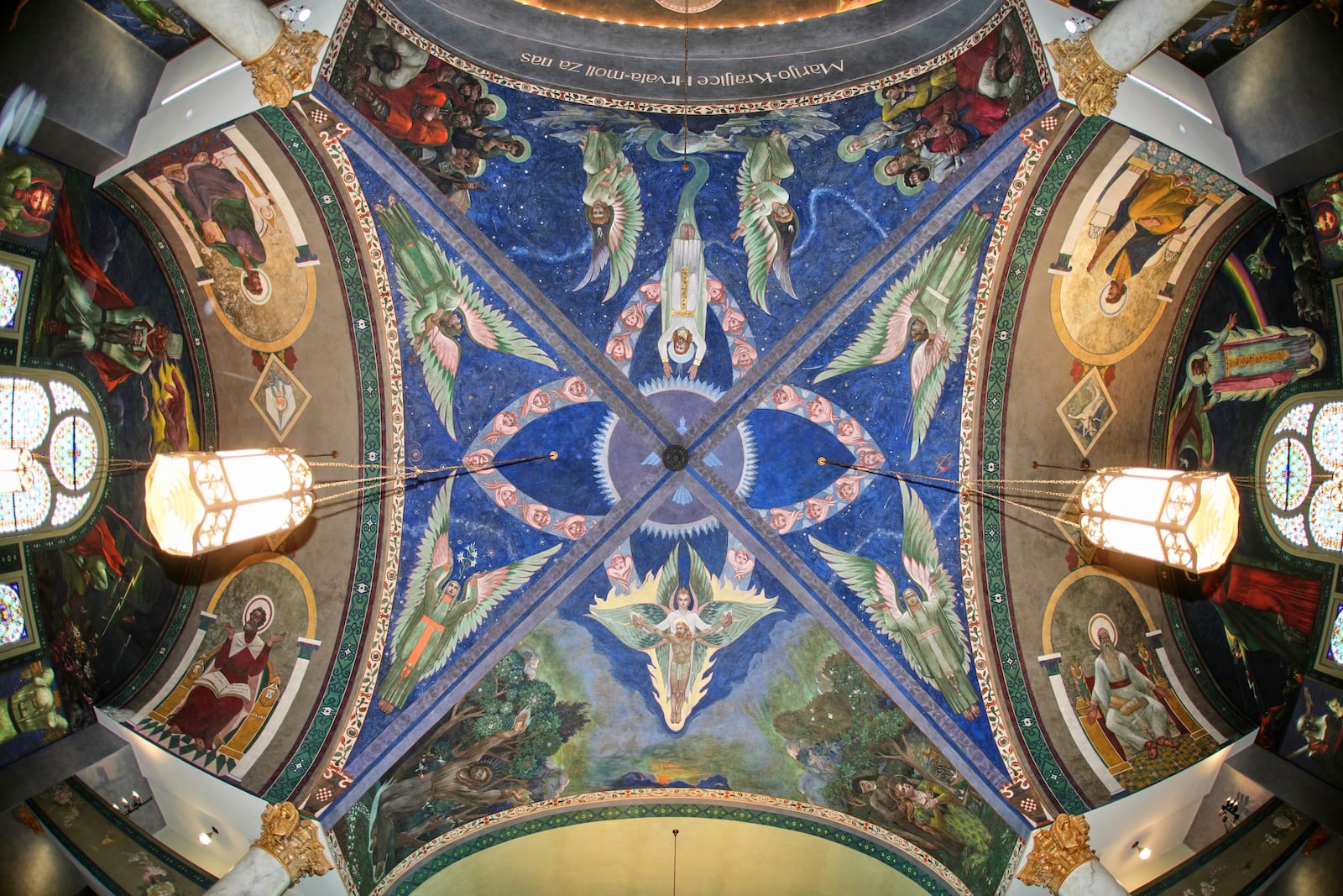 A mural by Croatian-American artist Maxo Vanka titled "Transcendent Vision (including Disciples)" is seen in St. Nicholas Croatian Catholic Church after undergoing preservation efforts in Millvale, Pa., Wednesday, May 28, 2025. (AP Photo/Gene J. Puskar)