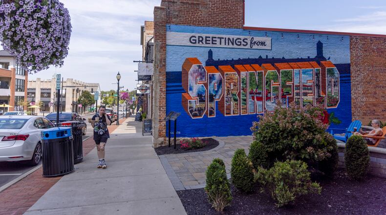 FILE — A “Greetings from Springfield” mural in Springfield, Ohio, on Aug. 27, 2024. In Springfield, threats leave Haitian residents shaken; tension hangs over the city after a week of closings and lockdowns, and the strain of recent months has led some Haitian immigrants to consider moving to bigger cities. (Maddie McGarvey/The New York Times)