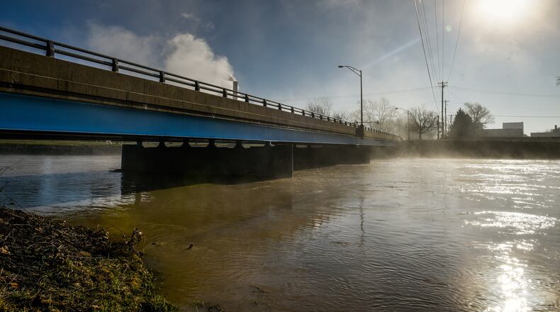 The Great Miami River near the Ohio 122 bridge in Middletown is seen after a heavy rainfall. NICK GRAHAM/FILE