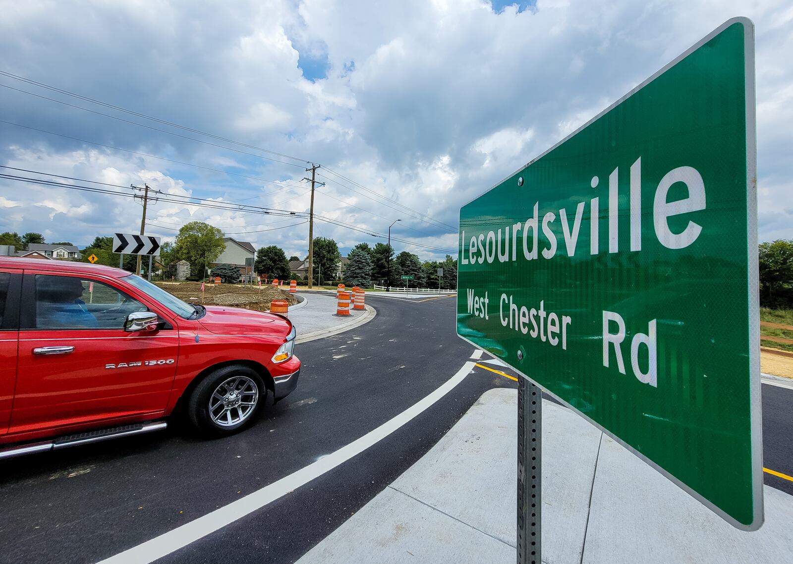 The roundabout at LeSourdsville West Chester Road and Millikin Road has been repaired and is now in operation with cosmetic decor still left to be completed. NICK GRAHAM / STAFF