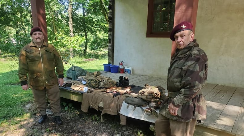 Reenactors at the Heritage Village Museum provide visitors a glimpse into life as a paratrooper during WWII complete with uniforms and artifacts. // CONTRIBUTED