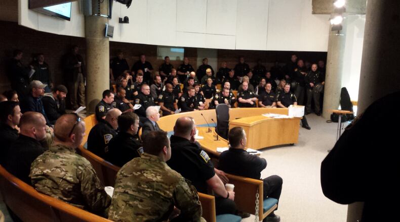 Officers from Middletown, Butler County Sheriff’s Office and US Marshals Office listing to briefing before Thursday’s warrant sweep. (PHOTO: MIDDLETOWN DIVISION OF POLICE)