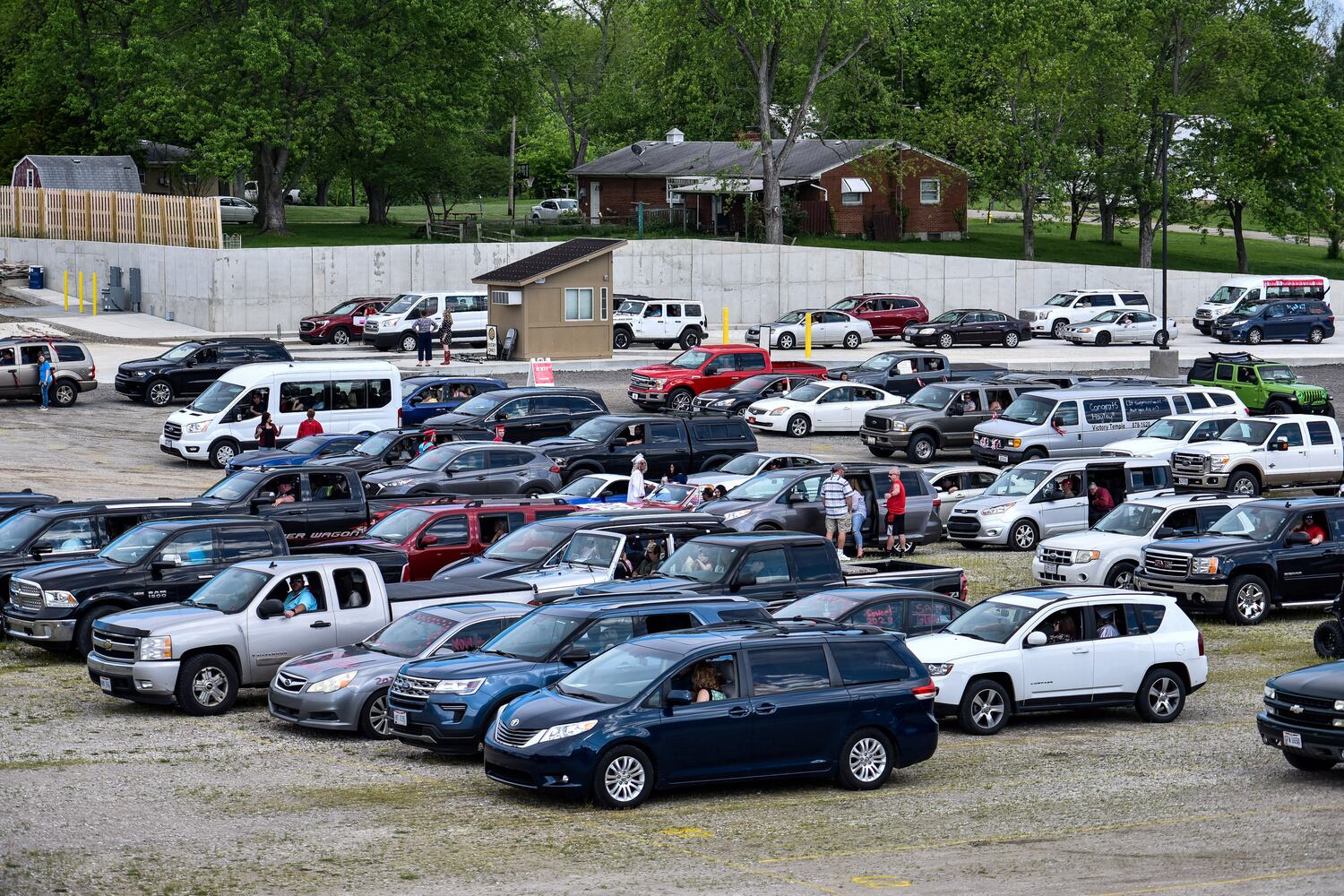 Madison High School drive-thru graduation ceremony at Land of Illusion