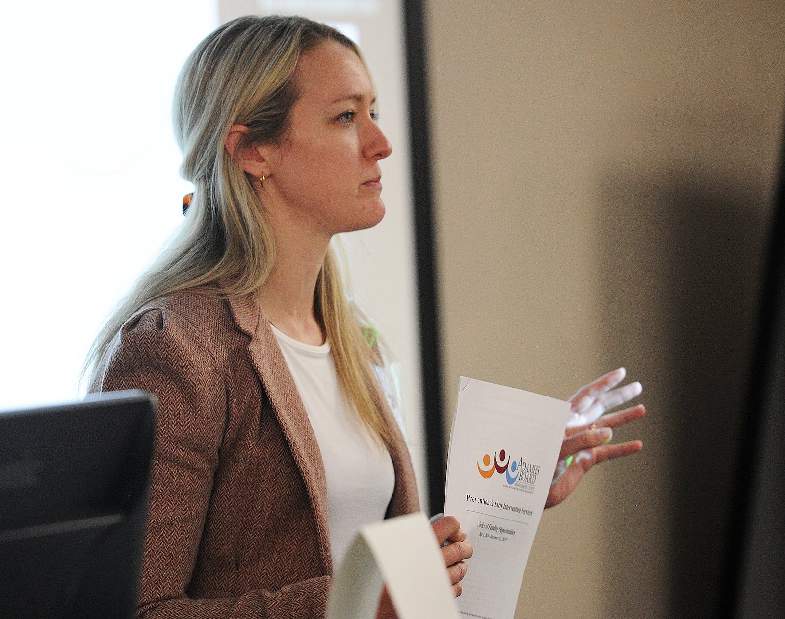Tristyn Ball, director of prevention and early intervention at Montgomery County Alcohol, Drug Addiction and Mental Health Services (ADAMHS), talks during an informational meeting on June 14, 2024 about changes to the board's funding cycle.  MARSHALL GORBY\STAFF