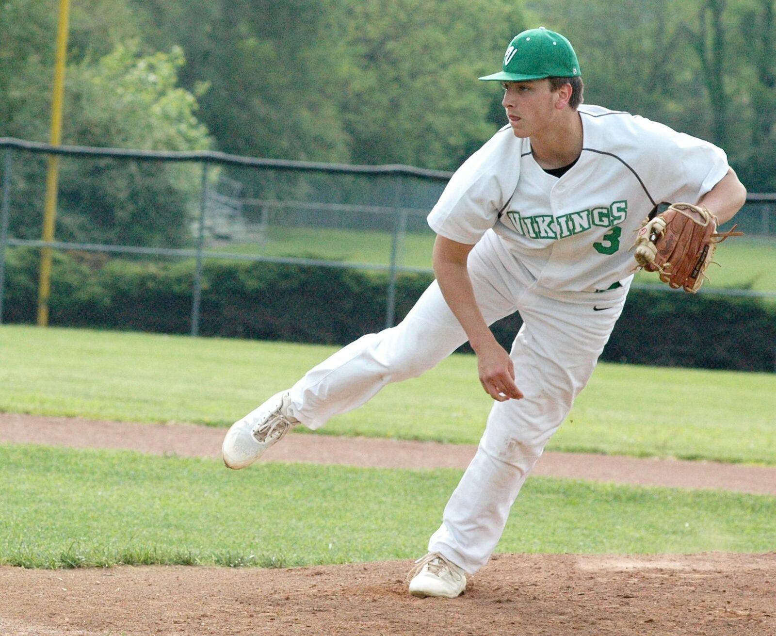 New Miami pitcher Danny Spivey sends a pitch toward the plate during Wednesday’s Division IV sectional baseball game against visiting Lockland. New Miami won 8-1. RICK CASSANO/STAFF
