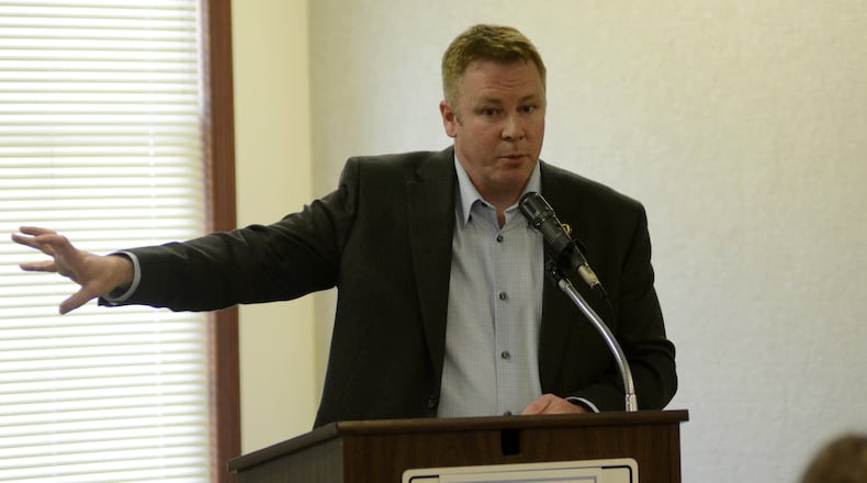 U.S. Rep. Warren Davidson, R-Troy, speaks to constituents on Wednesday in Oxford. MICHAEL D. PITMAN/STAFF