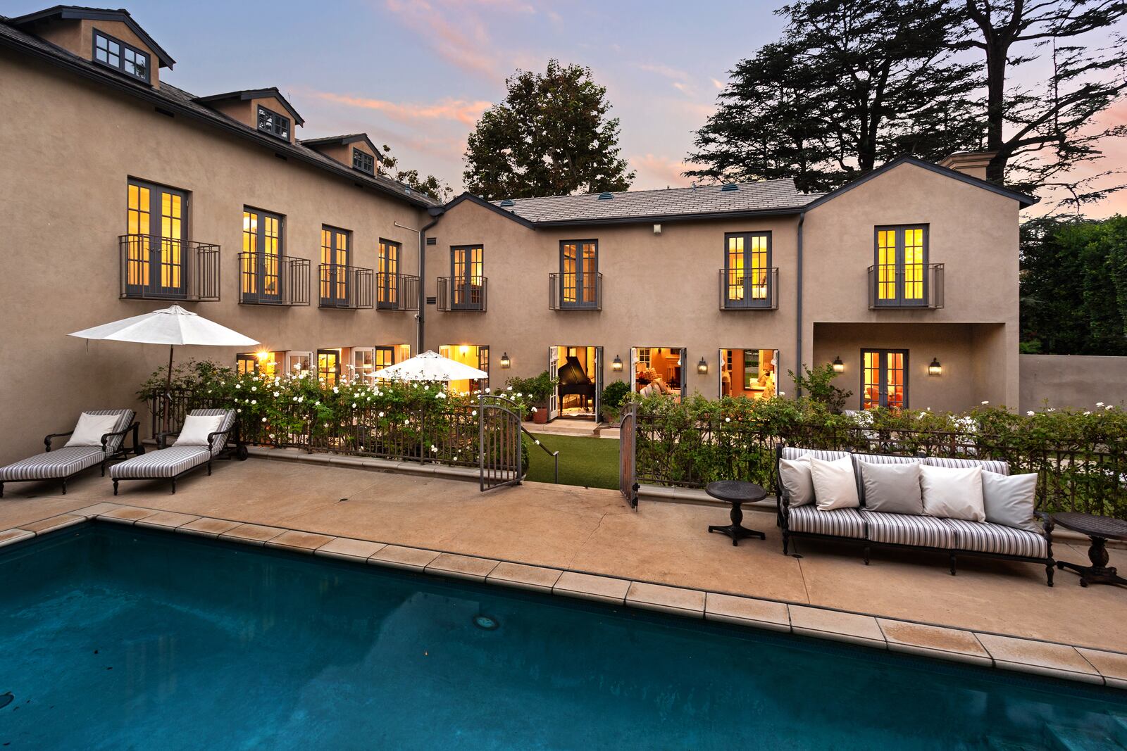 Television producer Shonda Rhimes is asking about $10 million for her Traditional-style home of about six years in Hancock Park. The updated 1920s home, which sits on a corner lot in the historic neighborhood, has mature trees, a swimming pool and a pool house. (Cameron Carothers)