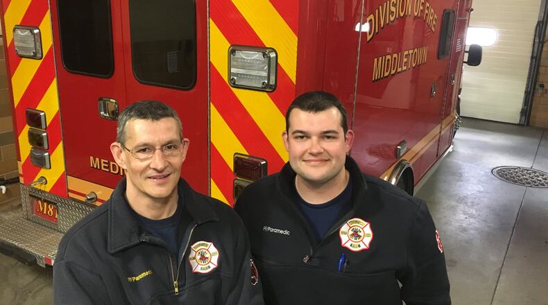 Pawel Mieczykowski, left, and his son, Michael, worked together as paramedics this week at the Middletown Division of Fire. This was the first time they had worked on the same shift, a rare practice for relatives.