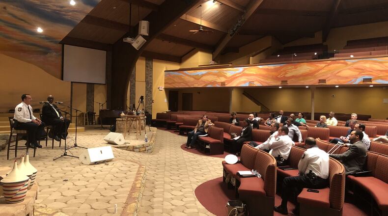 Joel Herzog, left, West Chester police chief, was the featured speaker at Friday’s racial conversation sponsored by the West Chester-Liberty Chamber Alliance at Zion Global Ministries. Kendall Wright served as facilitator. RICK McCRABB/STAFF