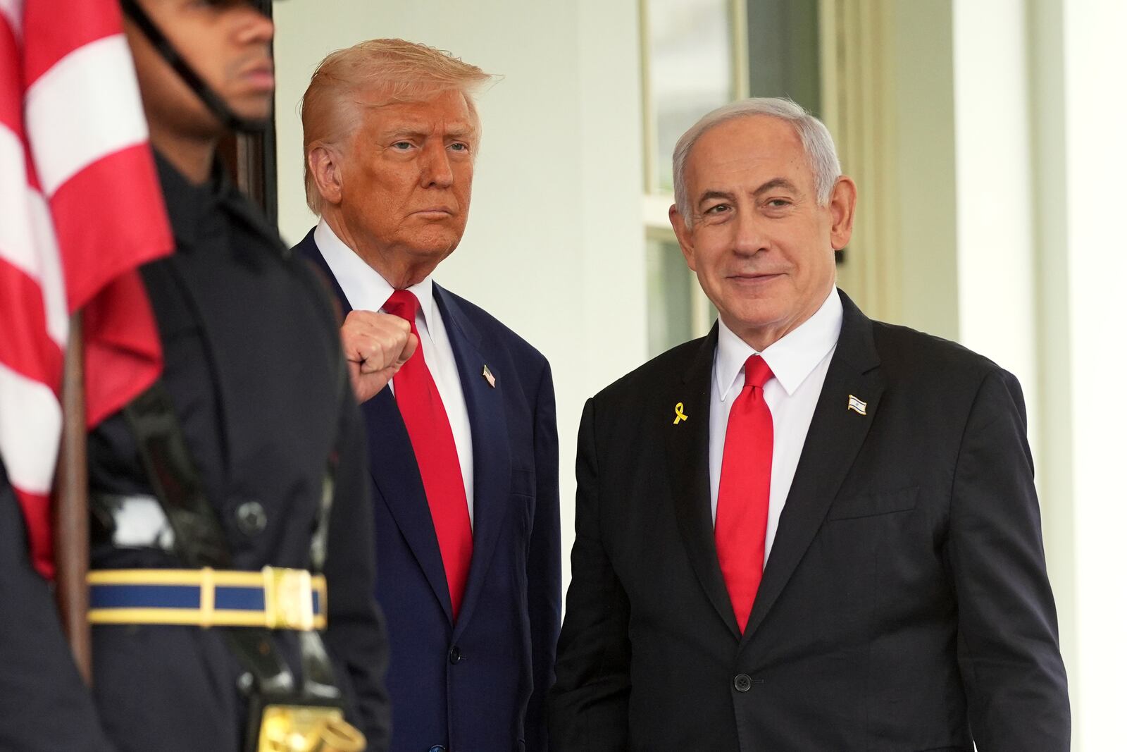 President Donald Trump, left, greets Israel's Prime Minister Benjamin Netanyahu at the White House, Monday, April 7, 2025, in Washington. (AP Photo/Evan Vucci)